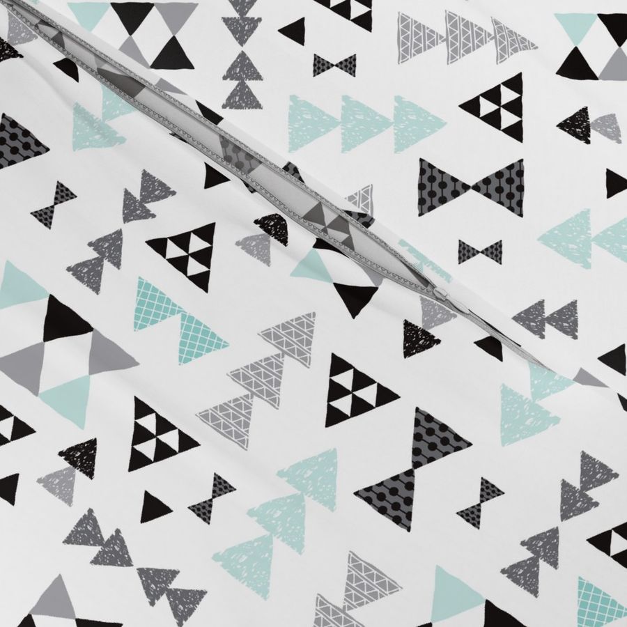 Geometric pastel blue bow tie and triangle tribal illustration pattern for boys or home decor