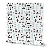 Geometric pastel blue bow tie and triangle tribal illustration pattern for boys or home decor