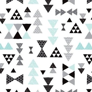 Geometric pastel blue bow tie and triangle tribal illustration pattern for boys or home decor