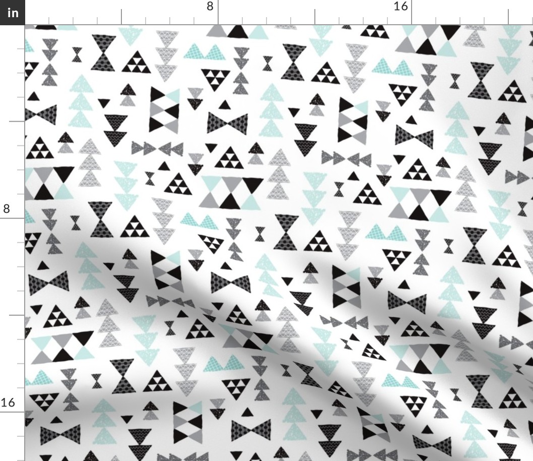 Geometric pastel blue bow tie and triangle tribal illustration pattern for boys or home decor