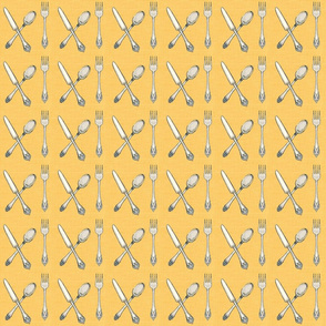 Silverware_on_Yellow_Linen