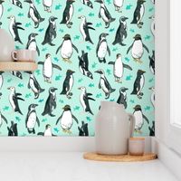 Watercolor Penguins with little Teal Fish on Mint