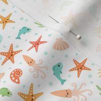 Kawaii sea life pattern with starfish, crabs, fish and seashells