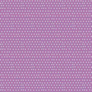 White,blue and pink dots on purple