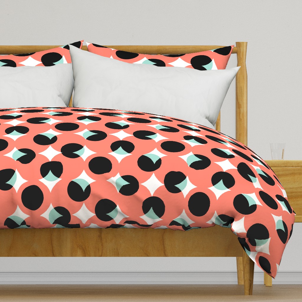 enormous halftone dots in coral, mint, black and white