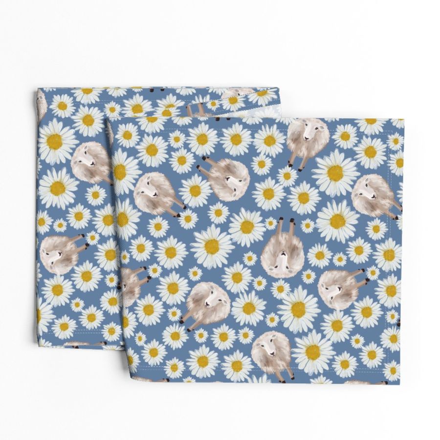 sheep and dasies on blue