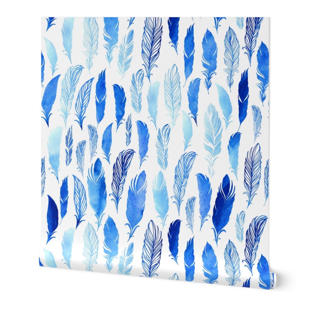 Blue watercolor feathers on white background