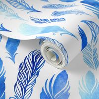 Blue watercolor feathers on white background