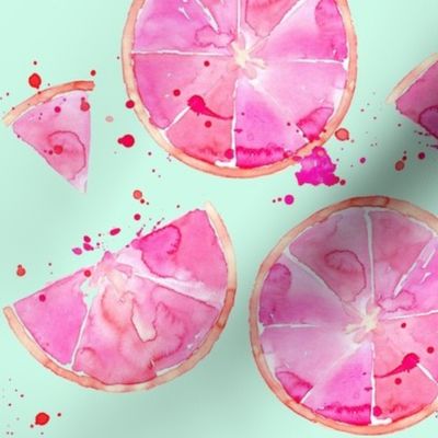 pink grapefruit on turquiose