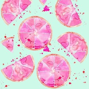 pink grapefruit on turquiose