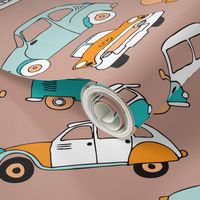 Cute vintage cars illustration with oldtimers and vw bus in retro colors and blue and orange illustration pattern for kids