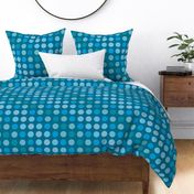 Large polka dots with blue hues.