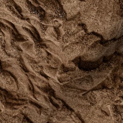 flowing sand, dark