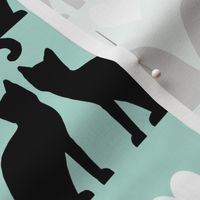 cats black and white on mint textile pastel design