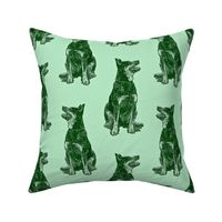 Sitting Australian cattle dog - green