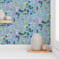 maxiflora ditsy floral in air blue with peach, coral and golden yellow