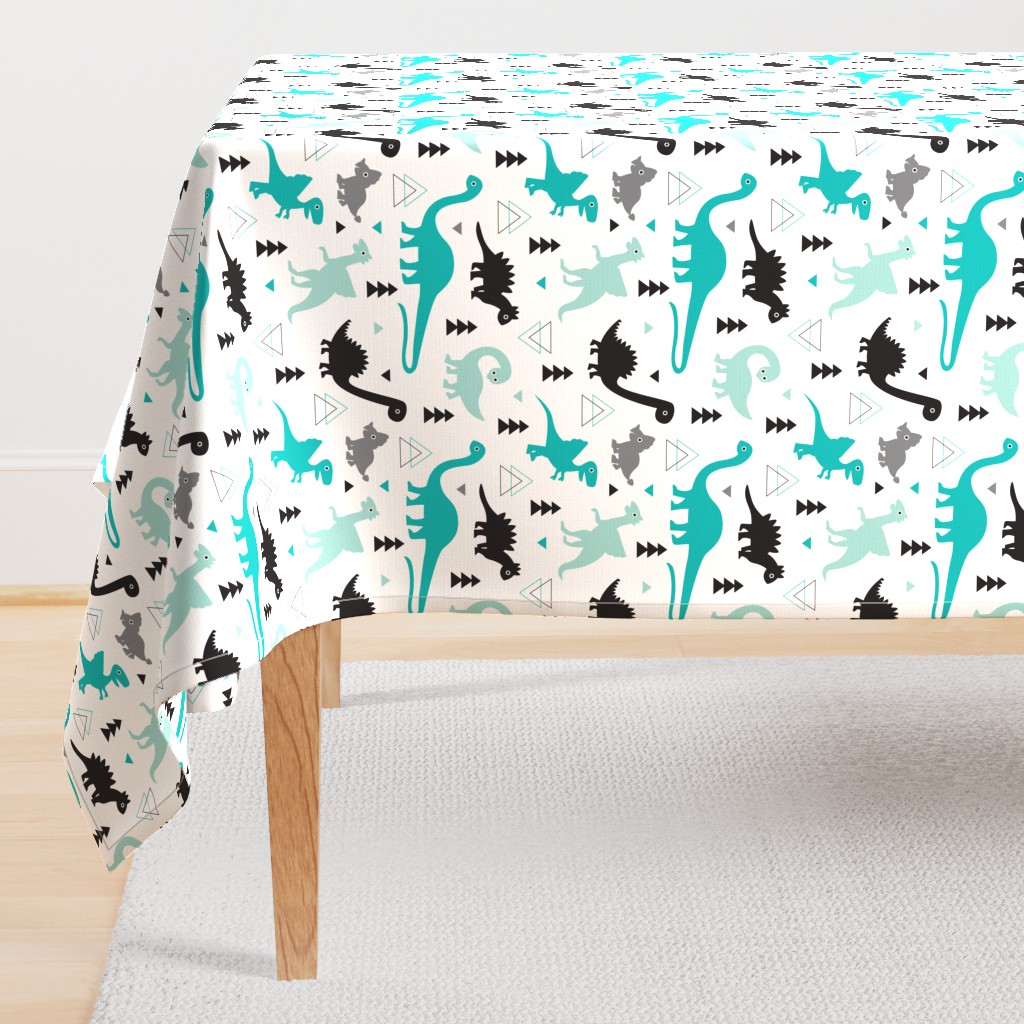 Adorable dino boys fabric with black and blue dinosaur geometric triangles and funky animal illustration theme for kids