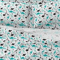 Adorable dino boys fabric with black and blue dinosaur geometric triangles and funky animal illustration theme for kids