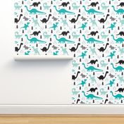 Adorable dino boys fabric with black and blue dinosaur geometric triangles and funky animal illustration theme for kids