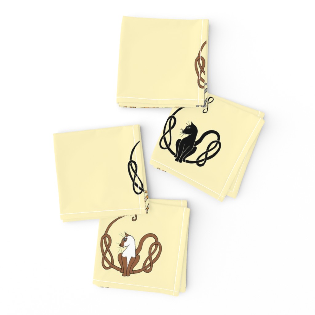 knot tail cats on cream small