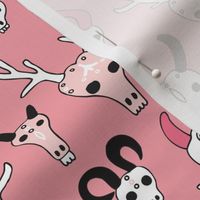 Skulls reindeer moose goat and other animals western hunt theme for creepy fashion and halloween coral pink