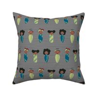 African Doll fabric gray background © Jennifer Garrett