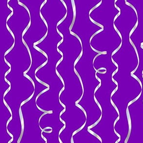 white curling ribbons on purple