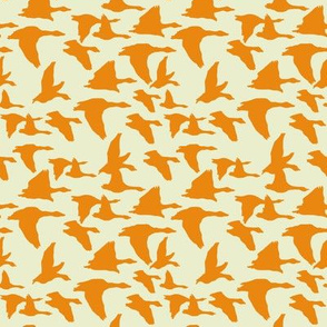 birds in flight orange and sage