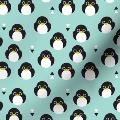 Adorable mint blue baby penguin birds with geometric detailing for kids