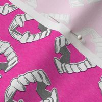 vampire teeth hot pink