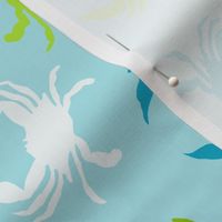 Crabs in blues, greens and whites on blue