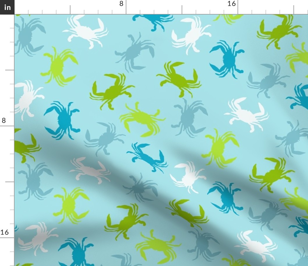 Crabs in blues, greens and whites on blue