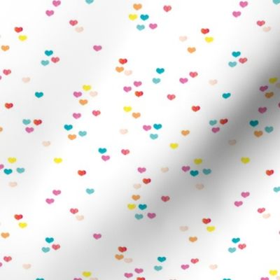 Little colorful watercolor hearts cut sprinkles confetti for birthday and party fabric