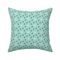 Trotting paw prints - coral on mint