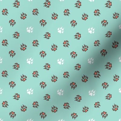 Trotting paw prints - coral on mint