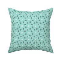 Trotting paw prints - black on mint with white