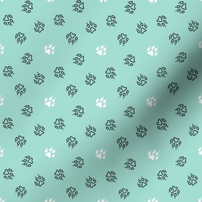 Trotting paw prints - black on mint with white