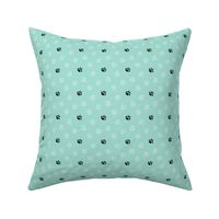 Trotting paw prints - white on mint with black