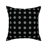 White Geometric Flowers on Black