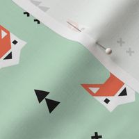 Cute geometric fox illustration scandinavian style fall pattern design in mint