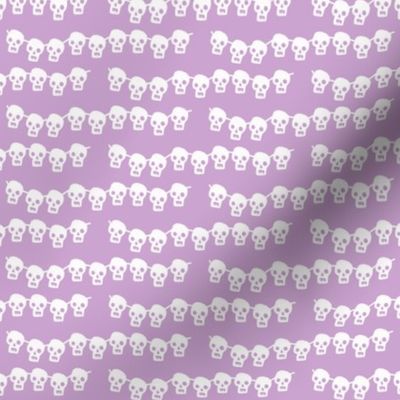 skeleton garland on pale purple