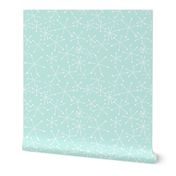 Snowflakes on pale blue