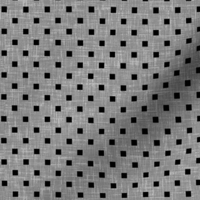 Black particles on gray linen-weave, a book cover by Su_G_©SuSchaefer