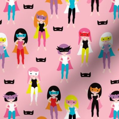 Colorful super hero girls with mask and cape fun heroine theme for kids pink