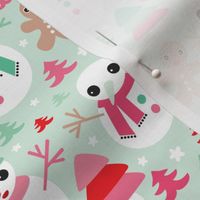 Colorful christmas theme with snowman and gingerbread man christmas trees and stars in mint and red