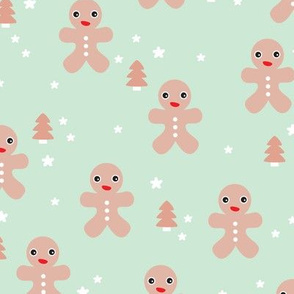 December happy holidays christmas theme kids gingerbread man and christmas trees and stars illustration in pastel mint