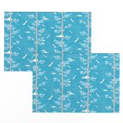 Pines and Cranes in Turquoise Blue (small scale) | Forest fabric, bird fabric in bright blue. Japanese print fabric, tree fabric with cranes and snow.