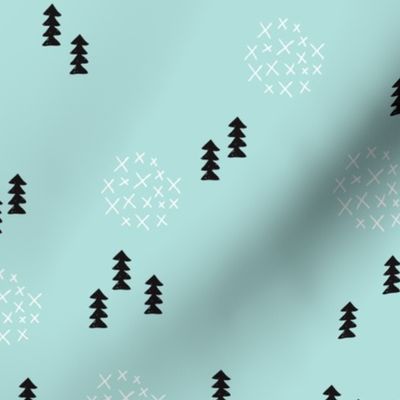 Scandinavian style christmas trees geometric woodland print in black and white and mint blue