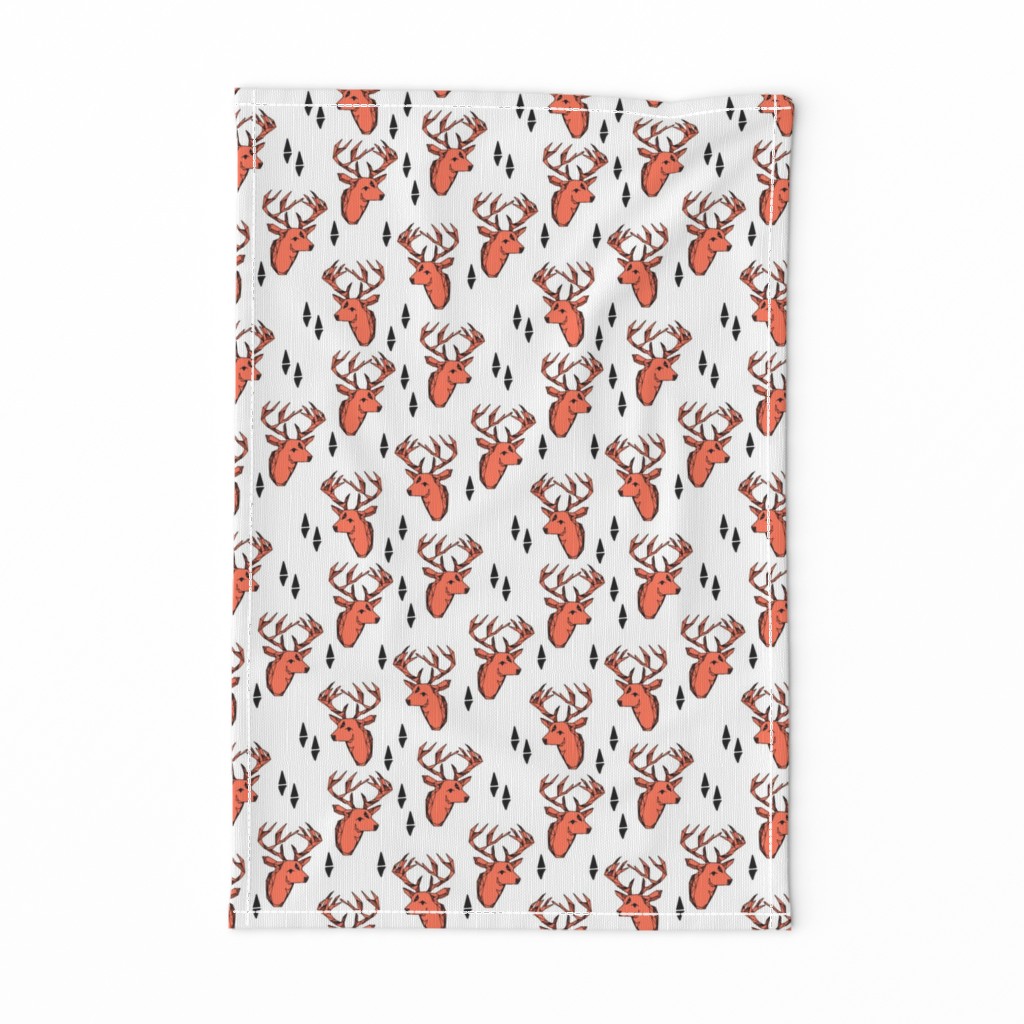 geo deer head // bright orange fabric deer head geometric design andrea lauren fabric