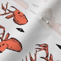 geo deer head // bright orange fabric deer head geometric design andrea lauren fabric